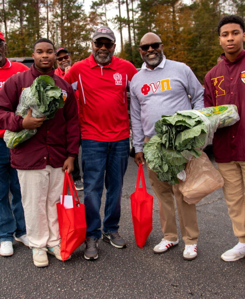 Columbia (SC) Alumni Chapter brothers and Kappa Leaguers distributing groceries to Midlands families